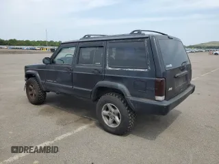 1999 Jeep Cherokee Sport with VIN 1J4FF68S9XL635836, listed as a Copart auction lot 59573195 with 187,035 mi miles and Salvage title. Bid and sale history available at DreamBid. Image 2.