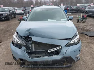 2022 Subaru Crosstrek Premium z VIN JF2GTACC4NG279633, wystawiony jako IAAI lot #42028843 z przebiegiem 38 450 mil mil oraz . Historia ofert i sprzedaży dostępna na DreamBid. Obrazek 6.