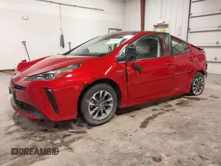 2021 Toyota Prius L Eco z VIN JTDKAMFU1M3143311, wystawiony jako IAAI lot #41961005 z przebiegiem 42 275 mil mil oraz . Historia ofert i sprzedaży dostępna na DreamBid. Obrazek 2.