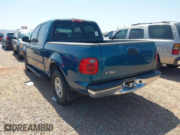 2001 Ford F-150 XLT with VIN 1FTRW07W01KA75819, listed as a IAAI auction lot 42293859 with 156,137 mi miles and . Bid and sale history available at DreamBid. Image 3.