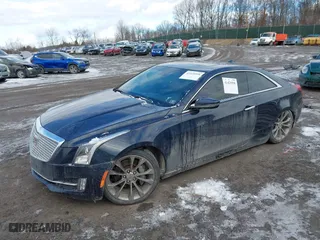 2016 Cadillac ATS Coupe Luxury Collection AWD with VIN 1G6AH1RX2G0125405, listed as a IAAI auction lot 41429998 with 69,365 mi miles. Bid and sale history available at carsss.com. Image 2.