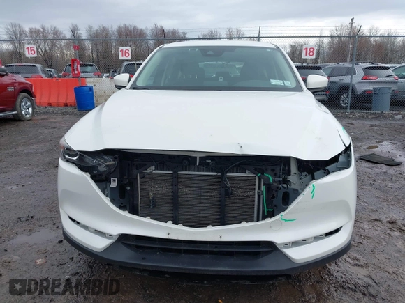 2019 Mazda CX-5 Sport with VIN JM3KFBBM2K0629966, listed as a IAAI auction lot 41953702 with 48,496 mi miles and . Bid and sale history available at DreamBid. Image 13.
