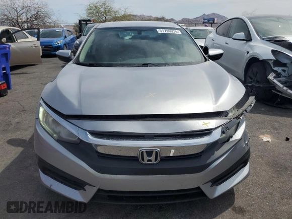 2018 Honda Civic LX with VIN 2HGFC2F56JH541164, listed as a Copart auction lot 51799975 with 94,850 mi miles and Salvage Title. Bid and sale history available at DreamBid. Image 5.