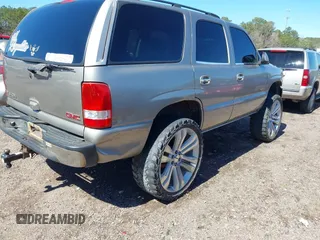 2001 GMC Yukon SLT with VIN 1GKEK13V11R220343, listed as a IAAI auction lot 41703786 with 213,518 mi miles. Bid and sale history available at carsss.com. Image 6.