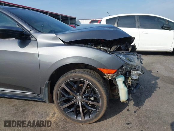 2021 Honda Civic Sport with VIN SHHFK7H44MU217741, listed as a IAAI auction lot 42029373 with 68,572 mi miles and . Bid and sale history available at DreamBid. Image 18.