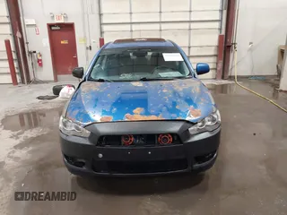 2009 Mitsubishi Lancer ES with VIN JA3AU26U29U036243, listed as a IAAI auction lot 41952044 with 181,650 mi miles. Bid and sale history available at carsss.com. Image 12.