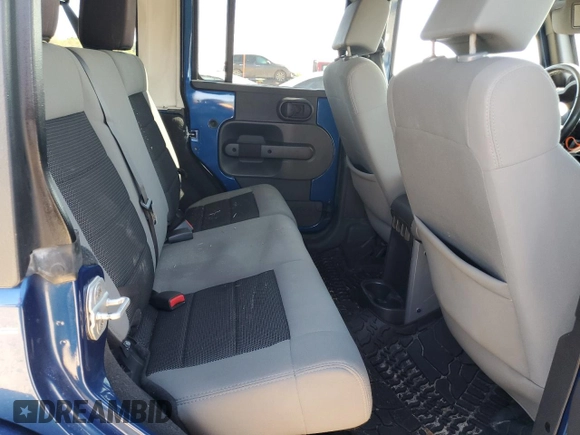 2010 Jeep Wrangler Unlimited Sahara with VIN 1J4BA5H19AL171369, listed as a Copart auction lot 50412855 with 152,742 mi miles and Salvage Title. Bid and sale history available at carsss.com. Image 11.
