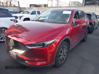 2018 Mazda CX-5 Grand Touring with VIN JM3KFBDM2J0333017, listed as a IAAI auction lot 41850431 with 85,000 mi miles. Bid and sale history available at carsss.com. Image 2.