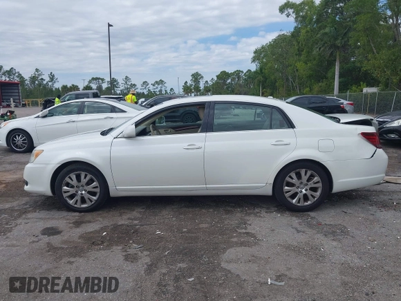 2010 Toyota Avalon XL with VIN 4T1BK3DB8AU354533, listed as a IAAI auction lot 41802797 with 117,956 mi miles and . Bid and sale history available at carsss.com. Image 14.