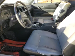 1983 Datsun 280ZX z VIN JN1HZ04S6DX571982, wystawiony jako Copart lot #86317294 z przebiegiem Nie podano mil oraz Tytuł czysty. Historia ofert i sprzedaży dostępna na DreamBid. Obrazek 7.