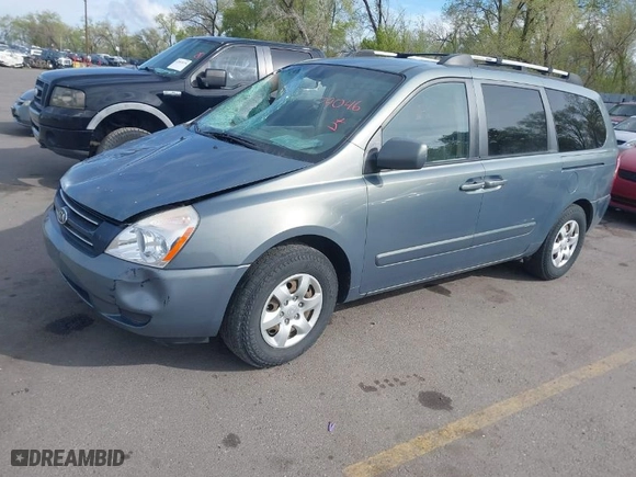 2006 Kia Sedona LX with VIN KNDMB233966090557, listed as a IAAI auction lot 42079046 with 198,851 mi miles. Bid and sale history available at carsss.com. Image 2.