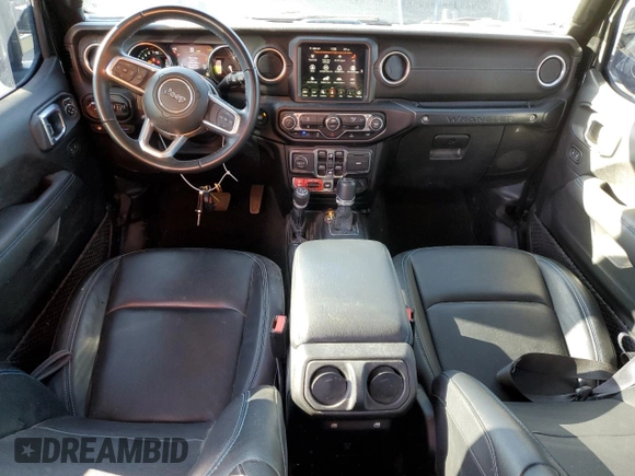 2022 Jeep Wrangler Unlimited Rubicon with VIN 1C4JJXR64NW198894, listed as a Copart auction lot 49899255 with 25,120 mi miles and Salvage title. Bid and sale history available at DreamBid. Image 8.