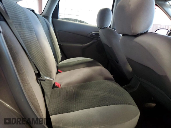 2002 Ford Focus ZX5 z VIN 3FAFP37352R180981, wystawiony jako Copart lot #55856125 z przebiegiem 59 785 mil mil oraz Szkoda całkowita • Salvage title. Historia ofert i sprzedaży dostępna na DreamBid. Obrazek 10.