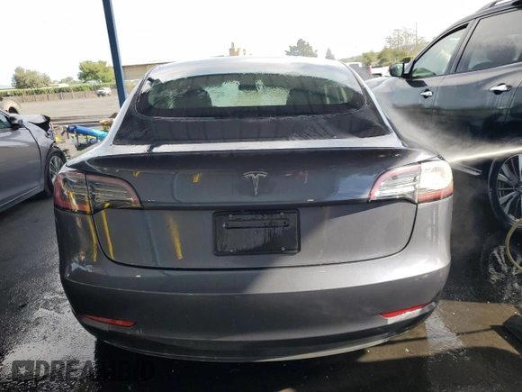 2023 Tesla Model 3 with VIN 5YJ3E1EA0PF449499, listed as a Copart auction lot 52900515 with 42,706 mi miles and Non Repairable. Bid and sale history available at DreamBid. Image 6.