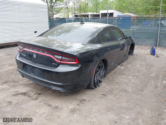 2016 Dodge Charger SXT with VIN 2C3CDXHG6GH332854, listed as a IAAI auction lot 42094761 with 114,883 mi miles. Bid and sale history available at carsss.com. Image 4.