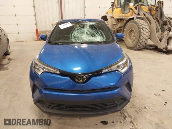 2019 Toyota C-HR XLE with VIN JTNKHMBX0K1042342, listed as a IAAI auction lot 41935879 with 54,190 mi miles and . Bid and sale history available at DreamBid. Image 12.