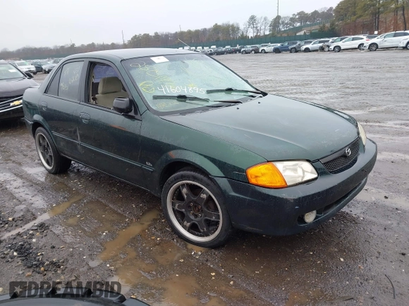 2000 Mazda Protege DX with VIN JM1BJ2225Y0255349, listed as a IAAI auction lot 41604895 with Not Provided miles and . Bid and sale history available at DreamBid. Image 1.