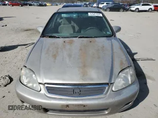 2000 Honda Civic LX with VIN 1HGEJ6676YL024485, listed as a Copart auction lot 42587424 with 176,591 mi miles and Clean Title. Bid and sale history available at carsss.com. Image 5.