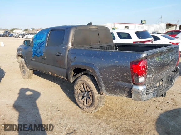 2021 Toyota Tacoma SR z VIN 5TFCZ5AN3MX272033, wystawiony jako IAAI lot #41689129 z przebiegiem Nie podano mil oraz . Historia ofert i sprzedaży dostępna na DreamBid. Obrazek 3.