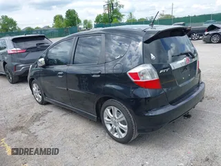 2010 Honda Fit Sport z VIN JHMGE8G45AS020143, wystawiony jako IAAI lot #42161201 z przebiegiem 176 800 mil mil oraz . Historia ofert i sprzedaży dostępna na DreamBid. Obrazek 3.