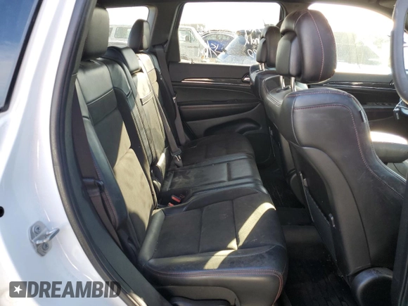 2021 Jeep Grand Cherokee Trailhawk with VIN 1C4RJFLG3MC646573, listed as a Copart auction lot 82687014 with 83,294 mi miles and Salvage Title. Bid and sale history available at carsss.com. Image 11.