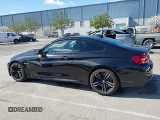 2015 BMW M4 with VIN WBS3R9C58FK334247, listed as a IAAI auction lot 41940211 with 125,881 mi miles. Bid and sale history available at carsss.com. Image 13.