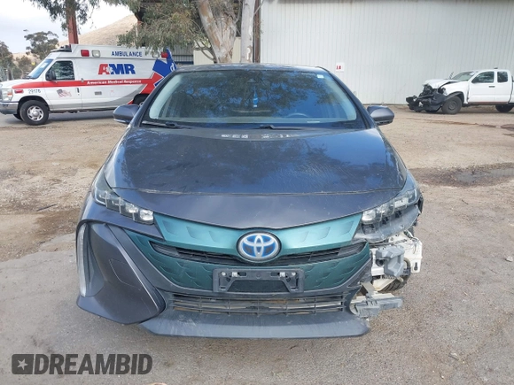 2018 Toyota Prius Plus with VIN JTDKARFPXJ3104302, listed as a IAAI auction lot 42127312 with 87,531 mi miles and . Bid and sale history available at DreamBid. Image 13.