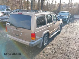 1999 Jeep Cherokee Sport with VIN 1J4FF68S2XL554452, listed as a IAAI auction lot 41930116 with 194,230 mi miles and . Bid and sale history available at DreamBid. Image 4.