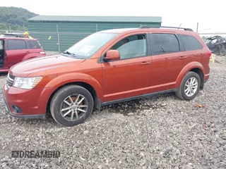 2013 Dodge Journey SXT with VIN 3C4PDDBG8DT510402, listed as a IAAI auction lot 42738111 with 107,786 mi miles and . Bid and sale history available at DreamBid. Image 2.