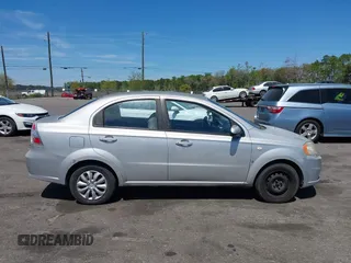 2007 Chevrolet Aveo LS with VIN KL1TD56617B098732, listed as a IAAI auction lot 41889243 with 115,426 mi miles and . Bid and sale history available at DreamBid. Image 13.