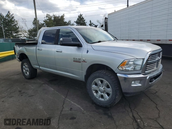 2014 Ram 2500 Big Horn with VIN 3C6UR5DL7EG141473, listed as a Copart auction lot 54074015 with 140,440 mi miles and Salvage title. Bid and sale history available at DreamBid. Image 4.