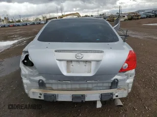 2006 Scion tC z VIN JTKDE167760067676, wystawiony jako Copart lot #59918215 z przebiegiem Nie podano mil oraz Szkoda całkowita • Salvage title. Historia ofert i sprzedaży dostępna na DreamBid. Obrazek 6.