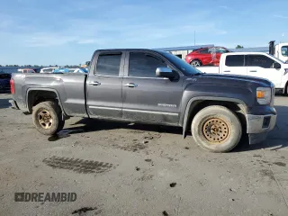 2014 GMC Sierra 1500 SLT with VIN 1GTV2VEJ1EZ330022, listed as a Copart auction lot 77237594 with 121,520 mi miles and Salvage Title. Bid and sale history available at carsss.com. Image 4.