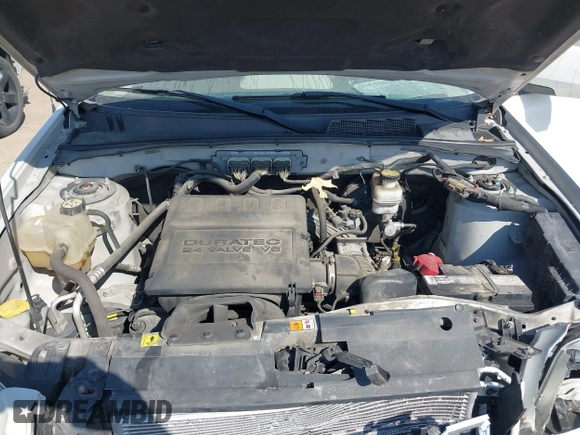 2010 Mercury Mariner Premier with VIN 4M2CN8HG5AKJ07771, listed as a IAAI auction lot 41779514 with 187,786 mi miles and . Bid and sale history available at DreamBid. Image 10.