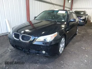 2005 BMW 5 Series 530i with VIN WBANA73545B049083, listed as a IAAI auction lot 41687711 with 206,013 mi miles. Bid and sale history available at carsss.com. Image 2.