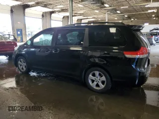 2013 Toyota Sienna LE AAS with VIN 5TDKK3DC7DS280463, listed as a Copart auction lot 61393215 with 195,785 mi miles and Salvage title. Bid and sale history available at DreamBid. Image 2.
