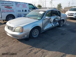 2004 Cadillac DeVille DHS with VIN 1G6KE54Y44U214112, listed as a IAAI auction lot 41563736 with 1 mi miles. Bid and sale history available at carsss.com. Image 16.