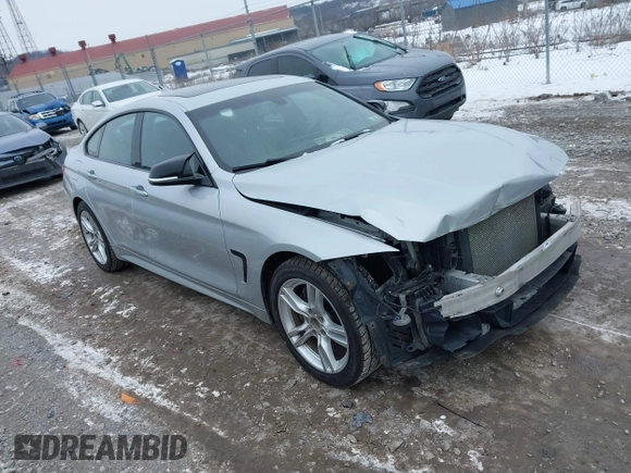 2016 BMW 4 Series 428i xDrive with VIN WBA4C9C53GG136870, listed as a IAAI auction lot 41410071 with 116,187 mi miles and . Bid and sale history available at DreamBid. Image 1.