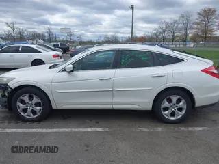 2010 Honda Crosstour EX-L z VIN 5J6TF2H57AL005231, wystawiony jako IAAI lot #42029109 z przebiegiem 134 451 mil mil oraz . Historia ofert i sprzedaży dostępna na DreamBid. Obrazek 14.