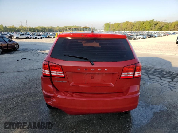 2015 Dodge Journey American Value with VIN 3C4PDCABXFT720583, listed as a Copart auction lot 52882515 with 173,575 mi miles and Salvage Title. Bid and sale history available at DreamBid. Image 6.