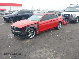 2014 BMW 4 Series 428i xDrive with VIN WBA3N9C57EK245350, listed as a IAAI auction lot 42184111 with 127,908 mi miles and . Bid and sale history available at DreamBid. Image 18.