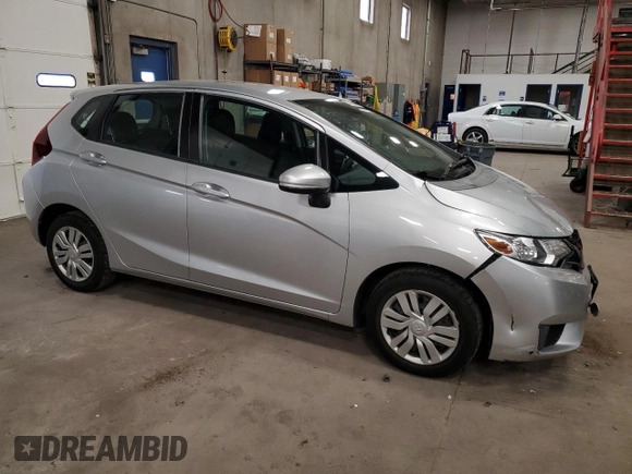 2015 Honda Fit LX с VIN 3HGGK5H56FM720996, выставлен на аукционе Copart как лот 57565945 с пробегом 90 222 миль миль и Списание • Salvage title. История ставок и продаж доступна на DreamBid. Изображение 4.