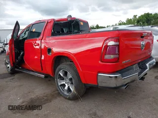 2022 Ram 1500 Laramie with VIN 1C6SRFJT5NN349361, listed as a IAAI auction lot 42342436 with Not provided miles and . Bid and sale history available at DreamBid. Image 3.