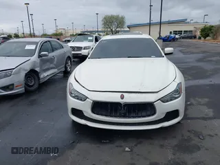 2014 Maserati Ghibli S Q4 with VIN ZAM57RTA3E1090350, listed as a IAAI auction lot 42056682 with 119,160 mi miles and . Bid and sale history available at DreamBid. Image 13.