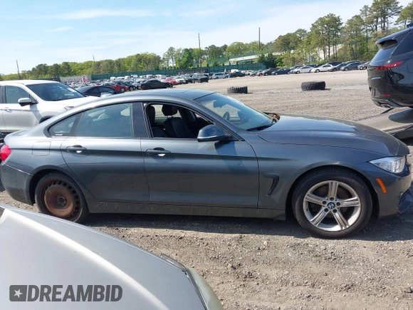 2015 BMW 4 Series 428i xDrive with VIN WBA4C9C55FD331921, listed as a IAAI auction lot 42214901 with 94,970 mi miles and . Bid and sale history available at DreamBid. Image 14.