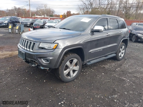 2014 Jeep Grand Cherokee Overland with VIN 1C4RJFCG5EC329377, listed as a IAAI auction lot 40822324 with 106,222 mi miles. Bid and sale history available at carsss.com. Image 20.