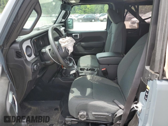 2024 Jeep Wrangler Sport S with VIN 1C4PJXAN5RW123740, listed as a Copart auction lot 62877324 with 5,758 mi miles and Salvage title. Bid and sale history available at DreamBid. Image 7.