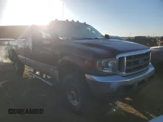 2004 Ford F-250 XL with VIN 1FTNX21L14EC45372, listed as a Copart auction lot 43745835 with 288,130 mi miles and Salvage title. Bid and sale history available at DreamBid. Image 4.