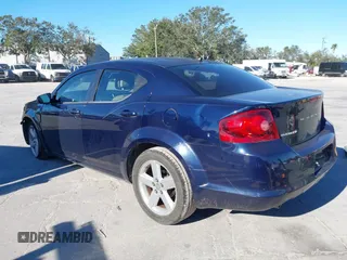 2014 Dodge Avenger SE with VIN 1C3CDZAG9EN223122, listed as a IAAI auction lot 40882250 with 139,552 mi miles. Bid and sale history available at carsss.com. Image 3.