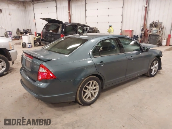 2012 Ford Fusion SEL with VIN 3FAHP0JA7CR223832, listed as a IAAI auction lot 41737269 with 90,004 mi miles. Bid and sale history available at carsss.com. Image 4.